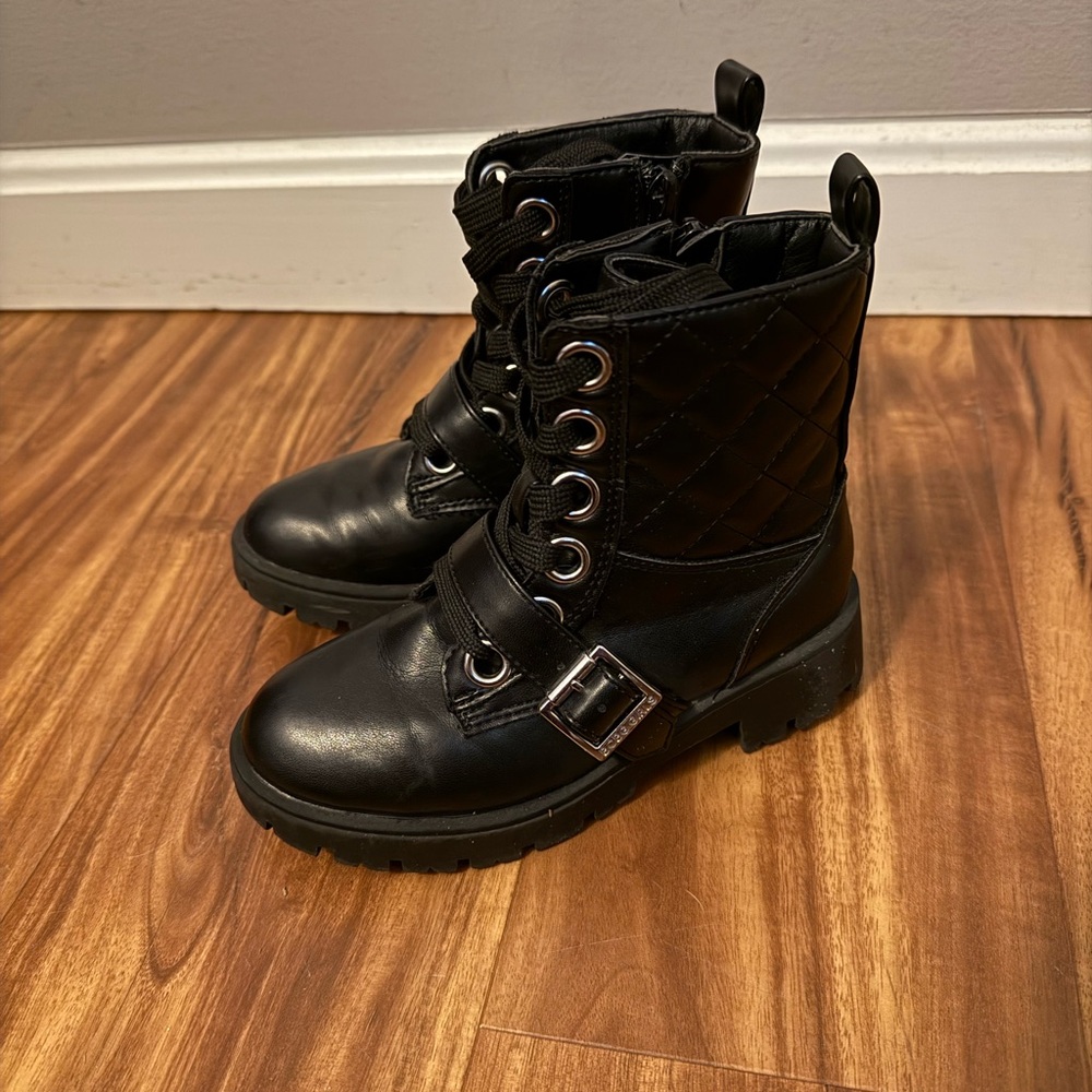 Little girl’s black combat style boots